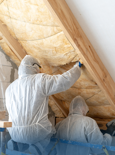 Attic insulation installation in progress